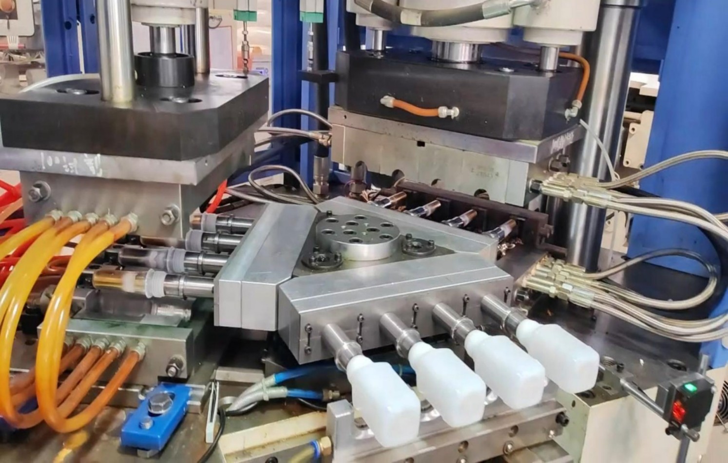 Precision injection blow molding for plastic bottles
